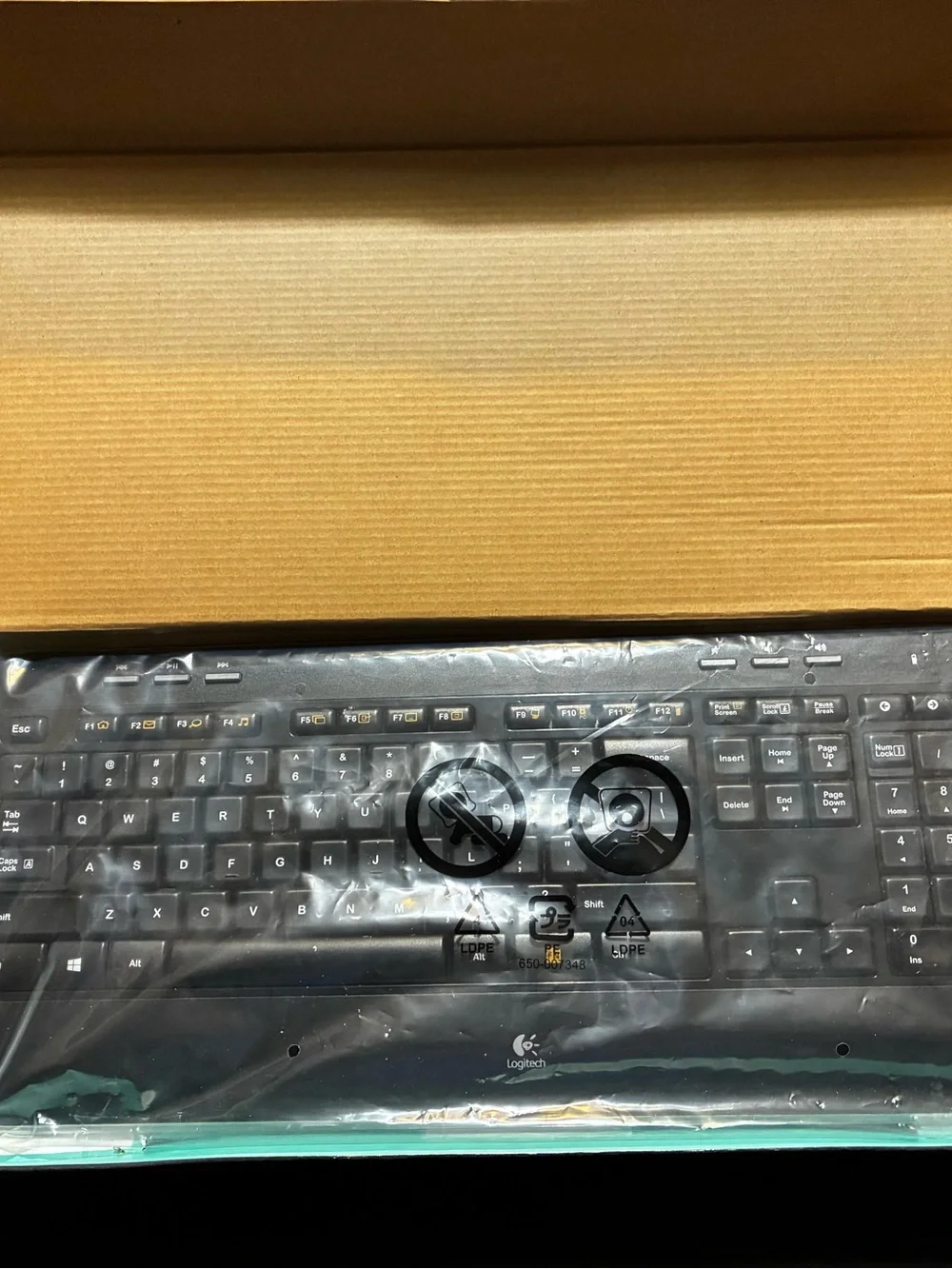 Logitech MK530 Wireless Keyboard and Mouse - Black with Teal Accents